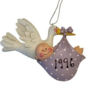 Stork Carrying A Baby Girl 1996